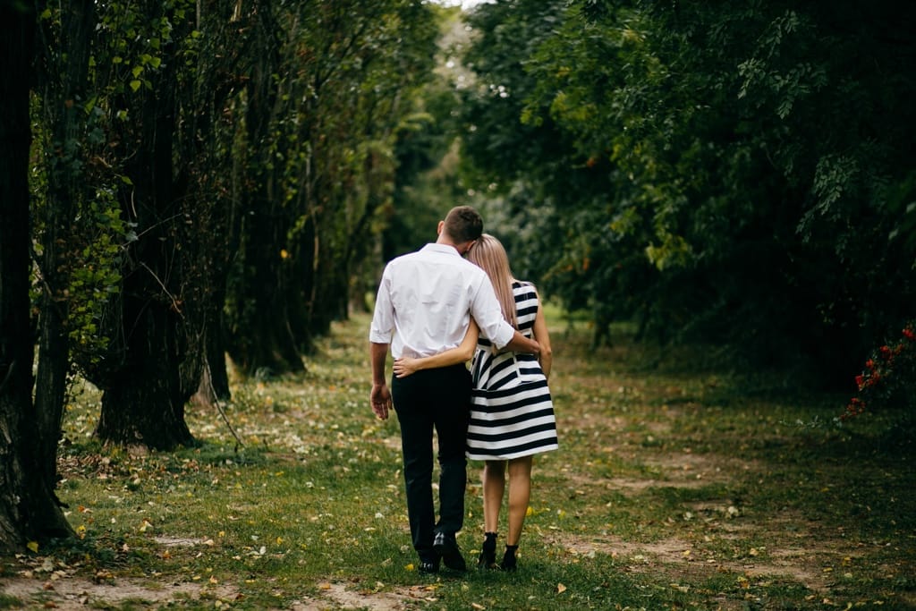 kissing couple walk on a square somewhere in ital 2022 01 18 23 33 47 utc